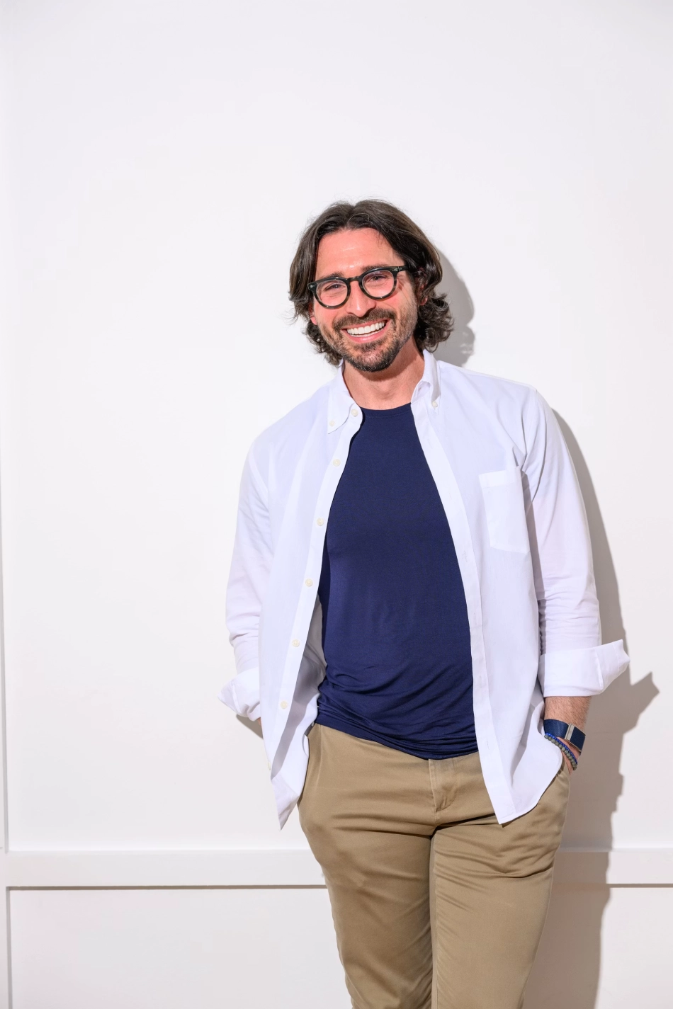 Portrait of a smiling man in a white jacket