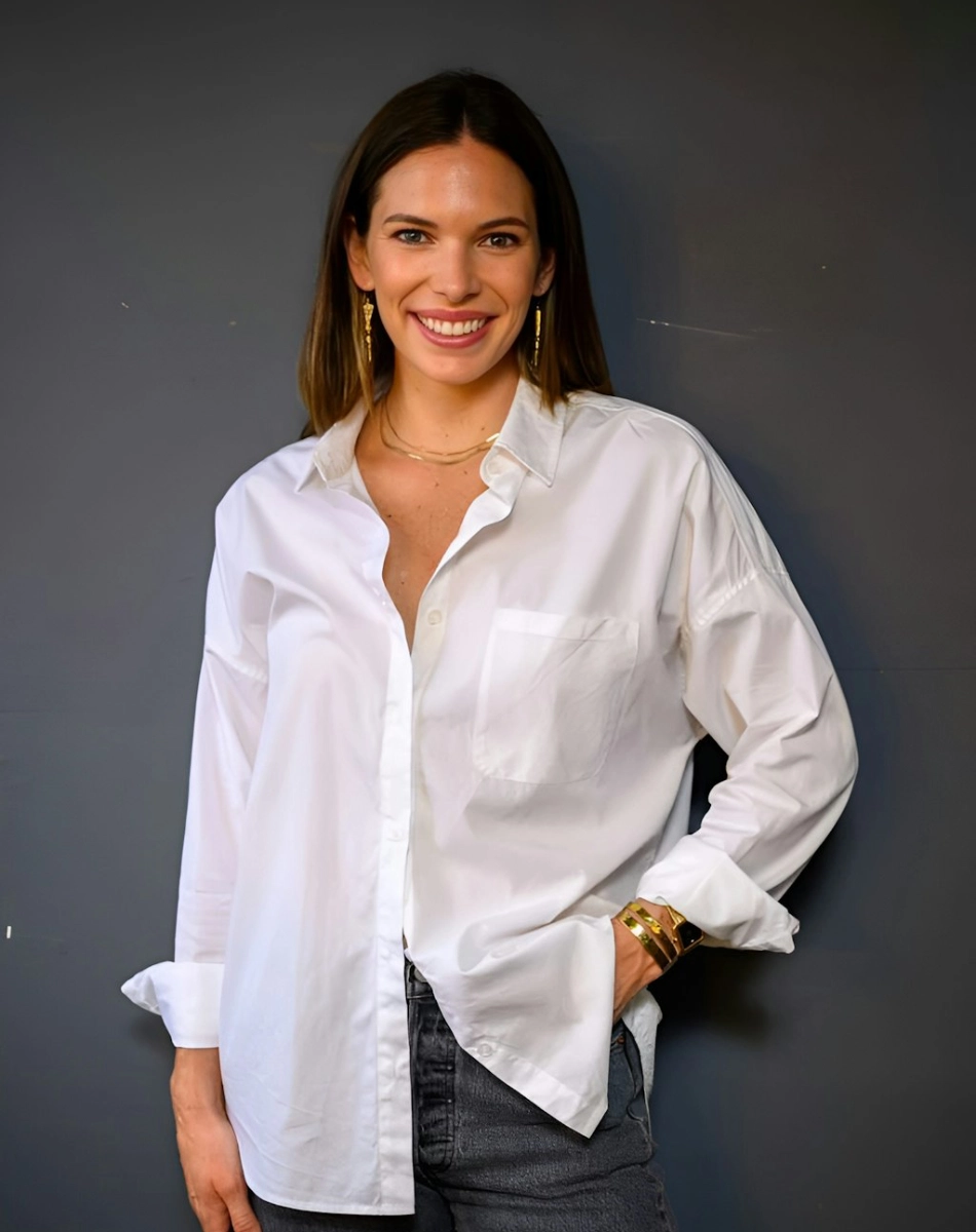 Portrait of a woman in white tshirt looking at the camera